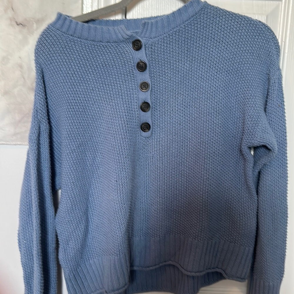 blue knitted sweater